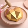 Smashable Golden Heart Chocolate Cake – A cake with a golden heart design and sweet surprises inside.
