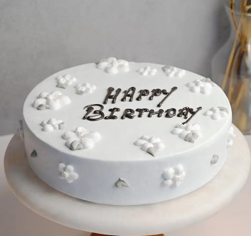 Screenshot 2024-11-13 220740 Creamy flower chocolate cake with elegant floral decoration and rich chocolate frosting