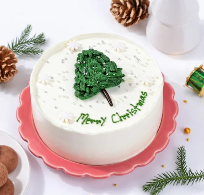 Screenshot 2024-12-05 125423 Festive Cheer Christmas Tree Cream Cake – A delicious holiday dessert with creamy filling.