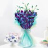 Elegant Blue Orchids beautifully arranged with a delicious treat, creating a perfect gift for birthdays, anniversaries, and special occasions.
