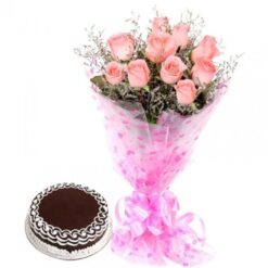 A beautiful bouquet of fresh flowers paired with a delicious cake, creating a delightful gift for any special occasion.