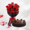 Elegant Rosy Delight Hamper featuring fresh roses, premium chocolates, and delightful goodies, beautifully arranged for a perfect gifting experience.