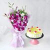 Luxury floral bouquet with a delectable cake, ideal for gifting on birthdays, anniversaries, and celebrations.