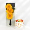 A charming bouquet of fresh flowers paired with a delicious cake, perfect for expressing love and joy on any occasion.