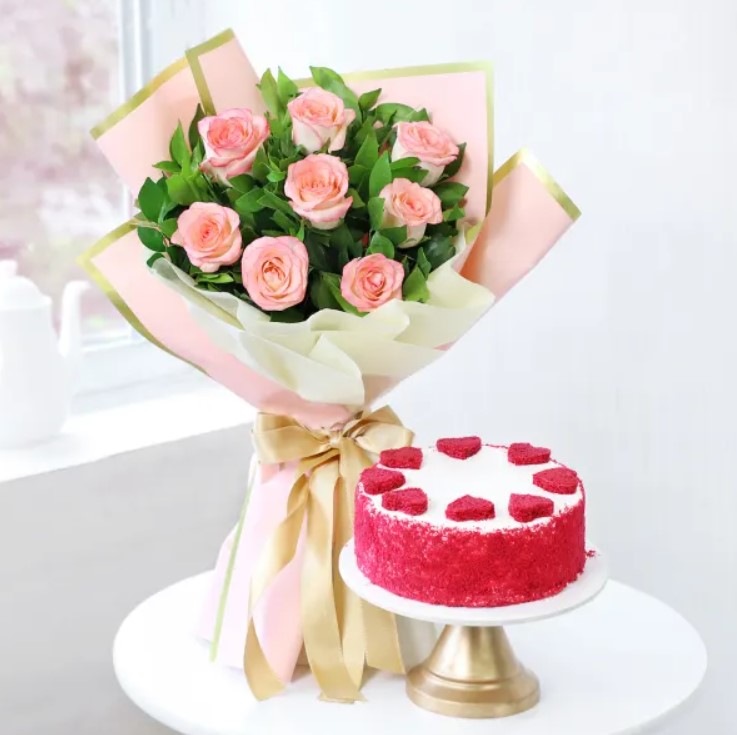 Graceful Petals & Cake Delight Beautiful rose bouquet with a delicious cake – the perfect combo for romantic surprises, anniversaries, and special moments.