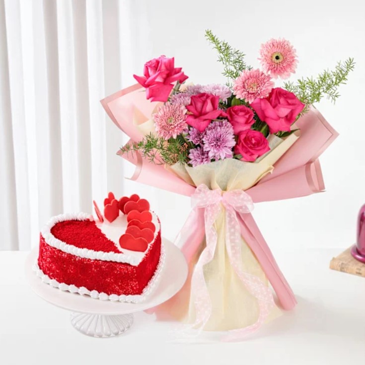 Lavish Petals And Heart Cake Elegant Velvet Rose Affair bouquet featuring deep red roses, beautifully arranged for a timeless romantic gift and special occasions.