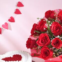 A luxurious bouquet of velvet roses paired with a heart-shaped cake, perfect for romantic celebrations and heartfelt surprises.