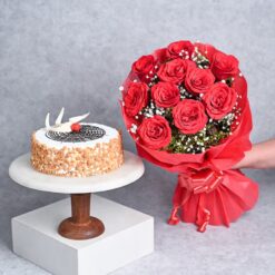 Butterscotch Rosy Embrace Combo featuring a vibrant bouquet of fresh roses and a rich, creamy butterscotch cake, perfect for any celebration.