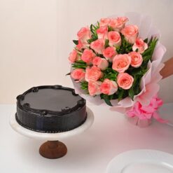 A beautiful bouquet of roses paired with a delicious cake, perfect for heartfelt celebrations and surprises.