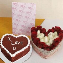 A lavish arrangement of vibrant roses paired with a delicious cake, ideal for special celebrations and heartfelt moments.